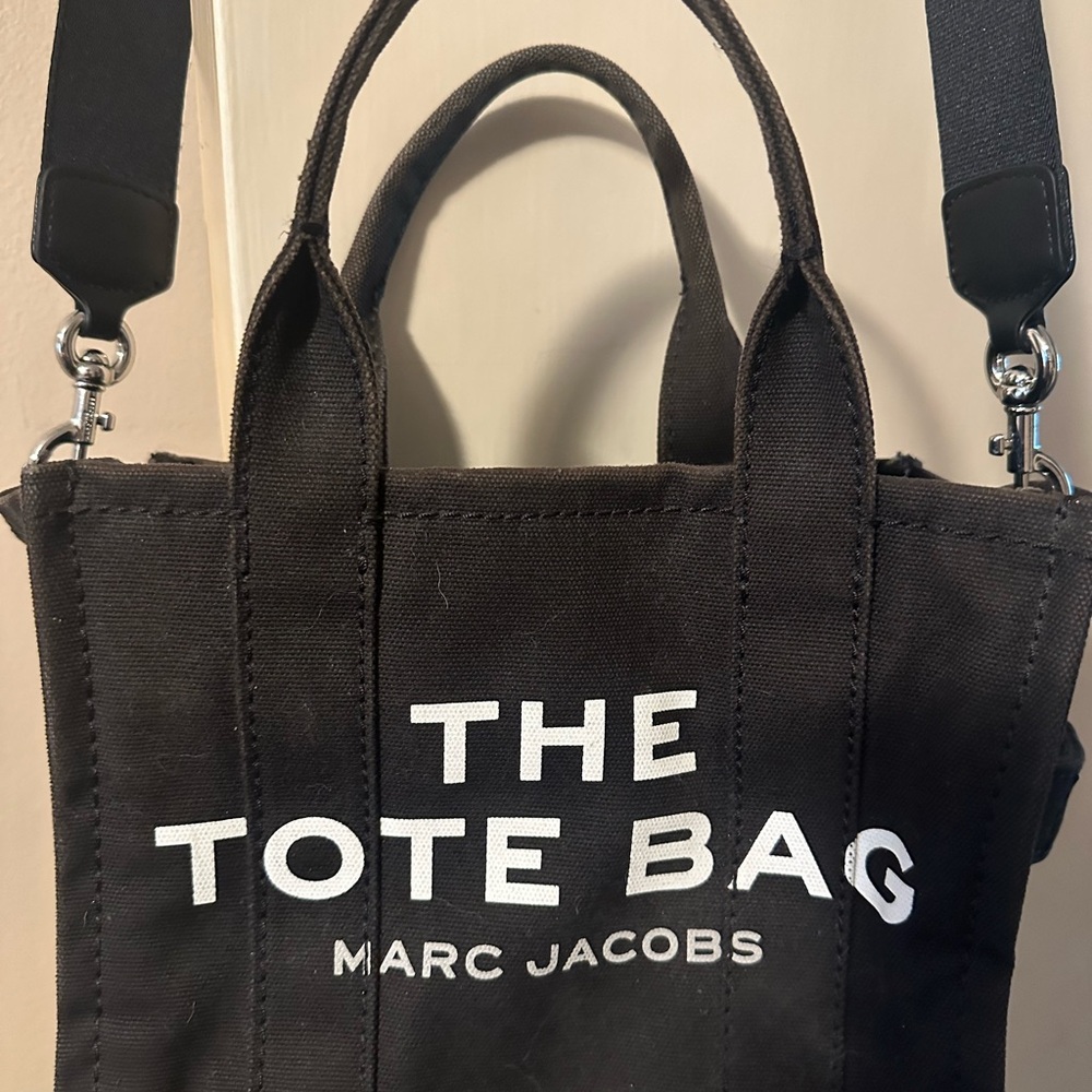 Marc Jacobs Black Tote Bag with Bold Text and Versatile Design